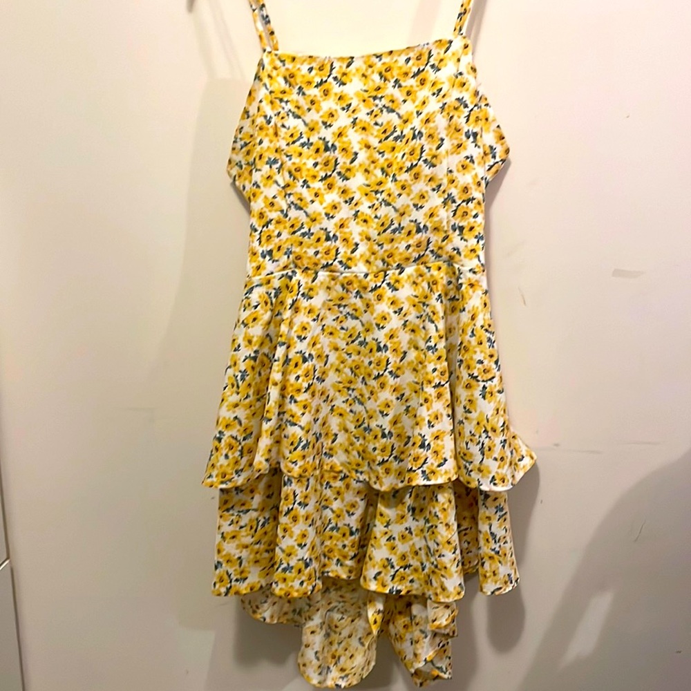 Adorable, floral Romper with ruffled skirt